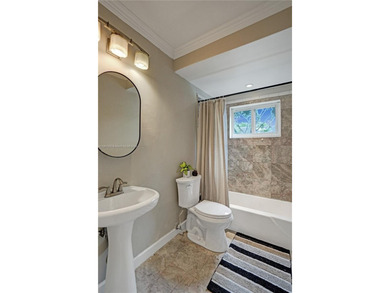 This 2/2 ALL AGES BUILDING Corner unit is a true GEM. A rare