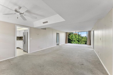 Opportunity in Prime Boca Raton Location! This top-floor corner