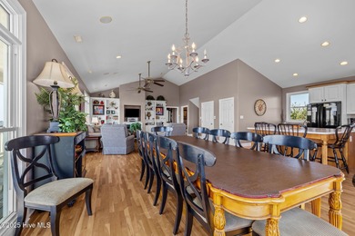 Perched on an elevated lot, this beautiful second-row home