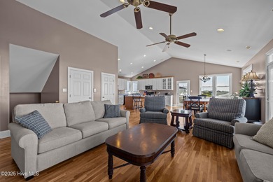 Perched on an elevated lot, this beautiful second-row home