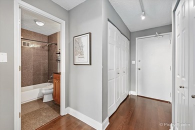 Welcome to this beautifully updated top-floor 1-bedroom, 1-bath