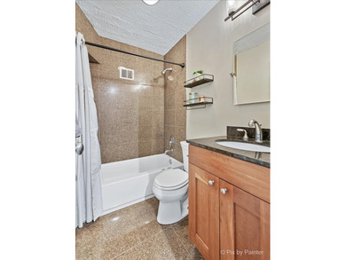 Welcome to this beautifully updated top-floor 1-bedroom, 1-bath