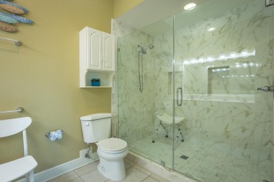 *Belle Isle* is a 4 bedroom 4 1/2 bath Mediterranean style home