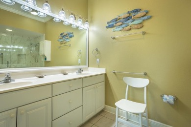 *Belle Isle* is a 4 bedroom 4 1/2 bath Mediterranean style home