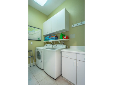 *Belle Isle* is a 4 bedroom 4 1/2 bath Mediterranean style home