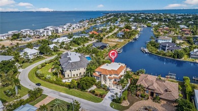 This exquisite canal front residence offers an exceptional