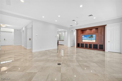 This exquisite canal front residence offers an exceptional