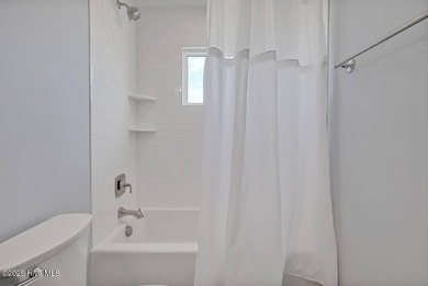 BIG INCOME PRODUCER!!! A perfect oceanfront location within