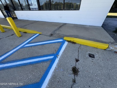 Former gas station for sale. Can be leased as well for $3,000.00