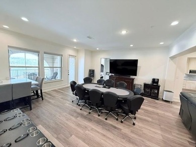 Welcome to refined luxury living nestled within the prestigious