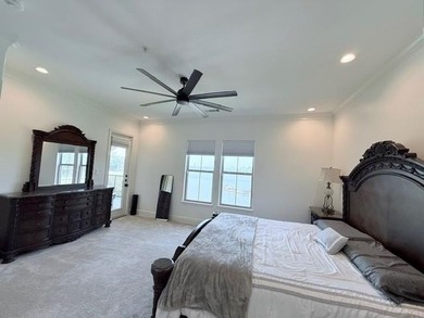 Welcome to refined luxury living nestled within the prestigious