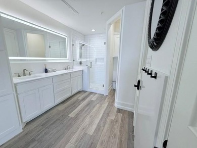 Welcome to refined luxury living nestled within the prestigious