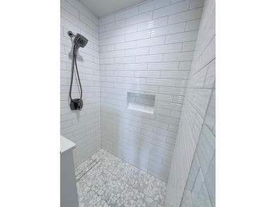 Welcome to refined luxury living nestled within the prestigious