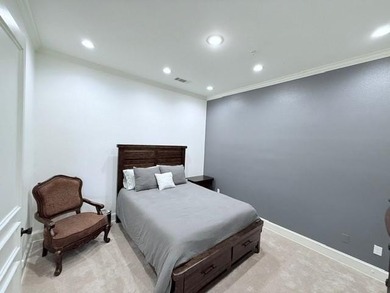 Welcome to refined luxury living nestled within the prestigious