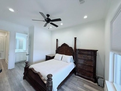 Welcome to refined luxury living nestled within the prestigious