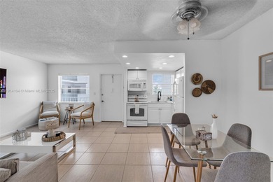 Live the true South Florida lifestyle in this beautifully