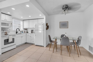 Live the true South Florida lifestyle in this beautifully