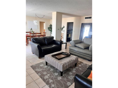 This spacious 2-bedroom, 2-bathroom condo at 1410 S Ocean Drive