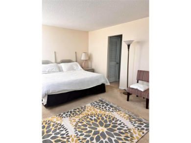 This spacious 2-bedroom, 2-bathroom condo at 1410 S Ocean Drive