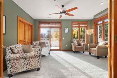 Experience refined waterfront living in this expansive