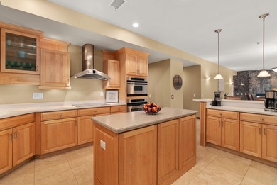 Experience refined waterfront living in this expansive