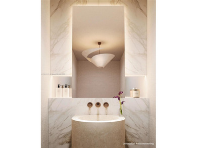 This luxury 2BR/2.5BA at 29 Indian Creek Drive offers a refined