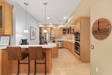 Experience refined waterfront living in this expansive