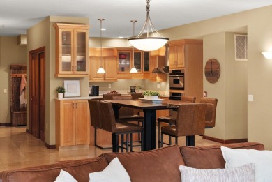 Experience refined waterfront living in this expansive