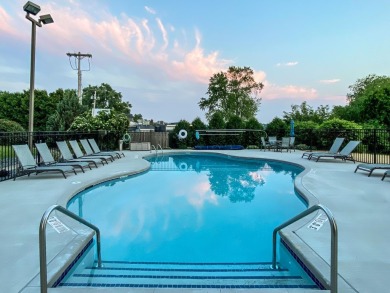 Experience refined waterfront living in this expansive