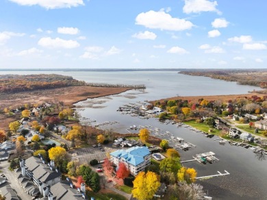 Experience refined waterfront living in this expansive