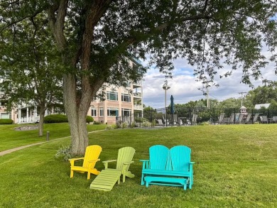 Experience refined waterfront living in this expansive