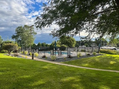 Experience refined waterfront living in this expansive