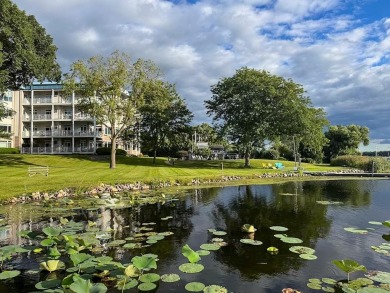 Experience refined waterfront living in this expansive