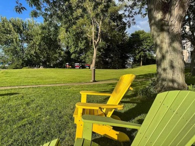 Experience refined waterfront living in this expansive