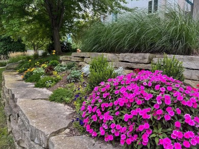 Experience refined waterfront living in this expansive