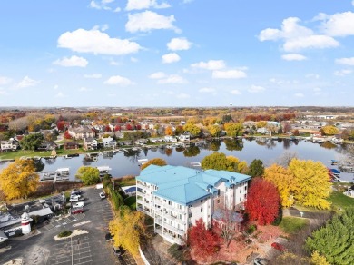 Experience refined waterfront living in this expansive