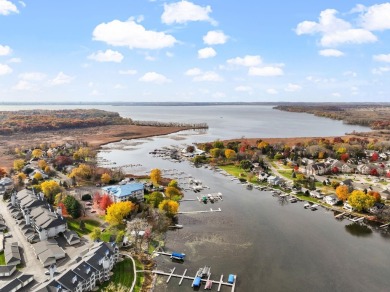 Experience refined waterfront living in this expansive