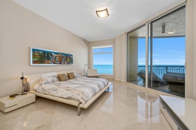 Contemporary elegance abounds in this luxury residence in gated