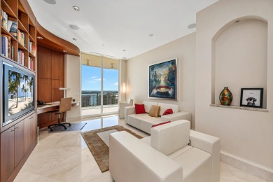 Contemporary elegance abounds in this luxury residence in gated
