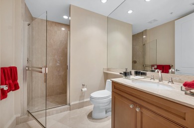 Contemporary elegance abounds in this luxury residence in gated