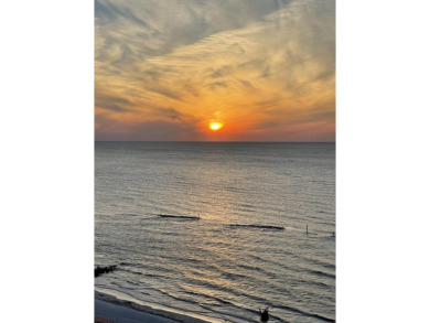 Contemporary elegance abounds in this luxury residence in gated