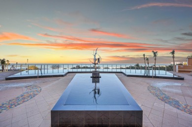 Contemporary elegance abounds in this luxury residence in gated