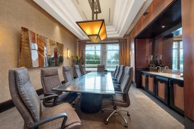 Contemporary elegance abounds in this luxury residence in gated