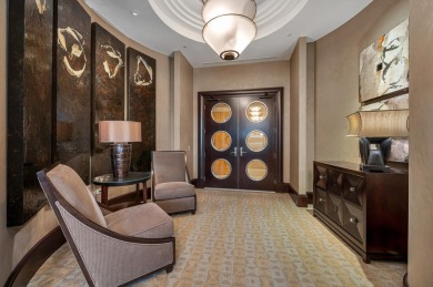 Contemporary elegance abounds in this luxury residence in gated