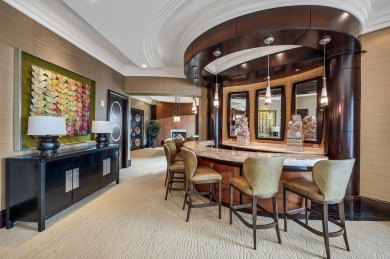 Contemporary elegance abounds in this luxury residence in gated