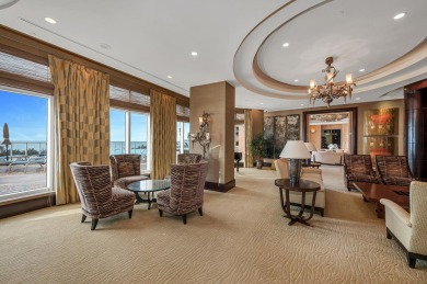 Contemporary elegance abounds in this luxury residence in gated