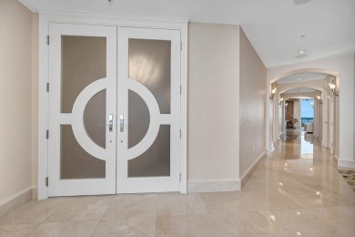 Contemporary elegance abounds in this luxury residence in gated