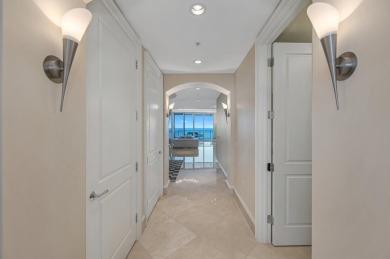 Contemporary elegance abounds in this luxury residence in gated