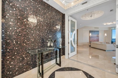 Contemporary elegance abounds in this luxury residence in gated