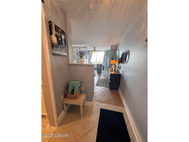 Turnkey and income-ready, this beautifully remodeled beachfront